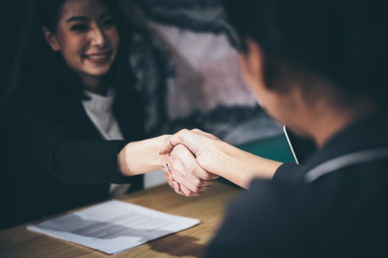 Successful job interview with boss and employee handshaking
